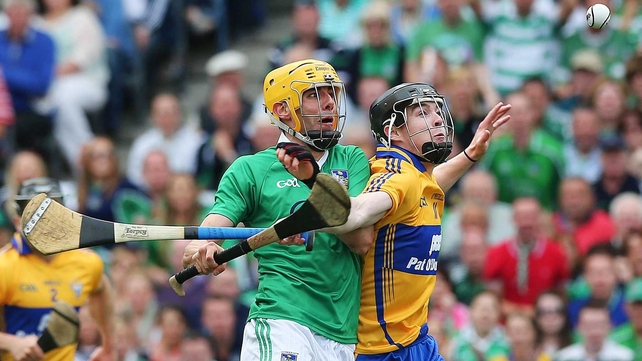 Tony Kelly keeps tabs on Limerick's David Breen in the All-Ireland semi-final