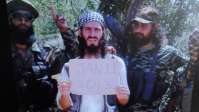 Abu Mansoor al-Amriki or 'the American' (centre), and a British national known as Usama al-Britani were shot dead in a dawn raid Abu Mansoor al-Amriki or 'the American' (centre), and a British national known as Usama al-Britani were shot dead in a dawn raid