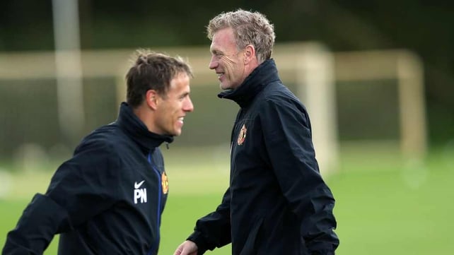David Moyes with coach Phil Neville as Manchester United prepare for the tie