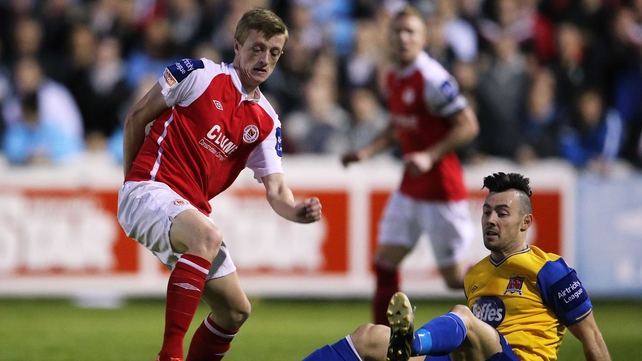 Chris Forrester of St Patrick's Athletic battles with John Dillon of Dundalk