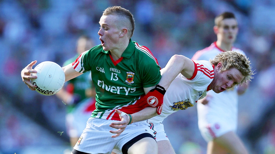 Darragh Doherty of Mayo tussles with Frank Burns