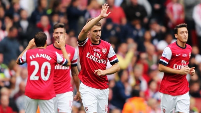 Aaron Ramsey celebrates after giving Arsenal the lead against Stoke