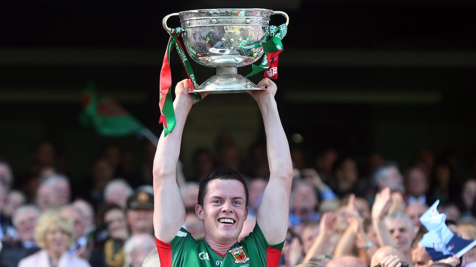 Mayo minor captain Stephen Coen lifts the cup
