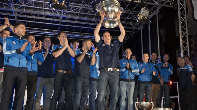 Dublin captain Stephen Cluxton shows off the Sam Maguire Cup to the crowd in Merrion Square