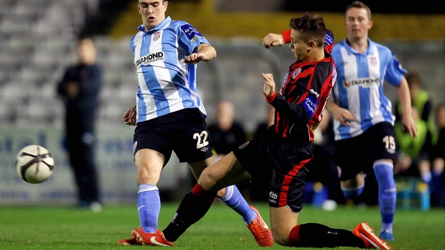 Bohs' Luke Byrne wins the ball from Michael Duffy of Derry