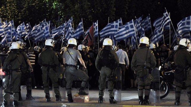 Police monitor a demonstration by Golden Dawn supporters in Athens Police monitor a demonstration by Golden Dawn supporters in Athens