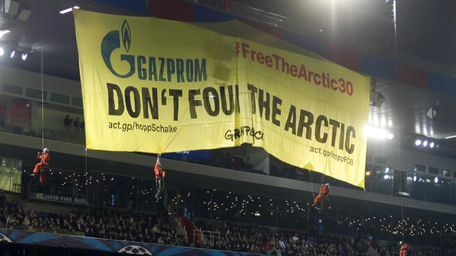 Greenpeace protested over the detention of the 30 members during a recent Champions League game between FC Basel and Schalke 04 Greenpeace protested over the detention of the 30 members during a recent Champions League game between FC Basel and Schalke 04