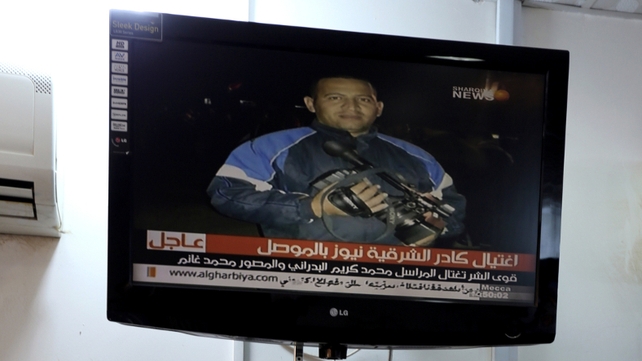 An unidentified gunmen shot two Iraqi television journalists dead as they were filming in the northern city of Mosul An unidentified gunmen shot two Iraqi television journalists dead as they were filming in the northern city of Mosul