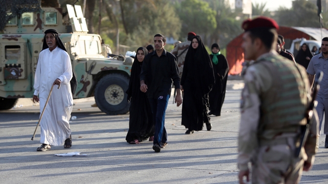 Security officials are on the streets in Iraq while Shia pilgrims visit shrines Security officials are on the streets in Iraq while Shia pilgrims visit shrines