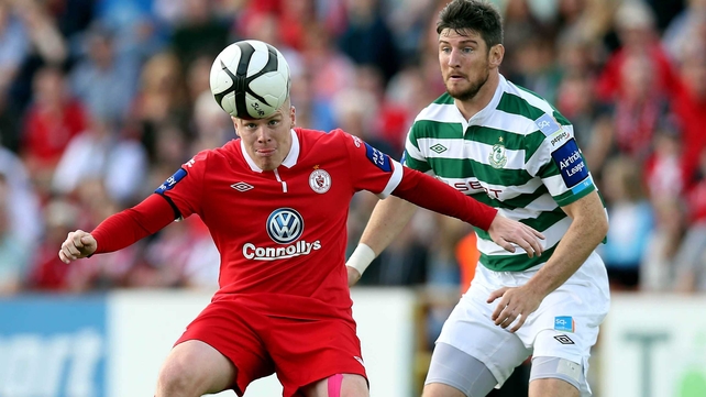 Sligo's Danny North (l) with Ken Oman of Shamrock Rovers