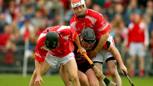 Stephen Power of Ballygunner is caught between Pa Walsh and Joseph Upton of Passage