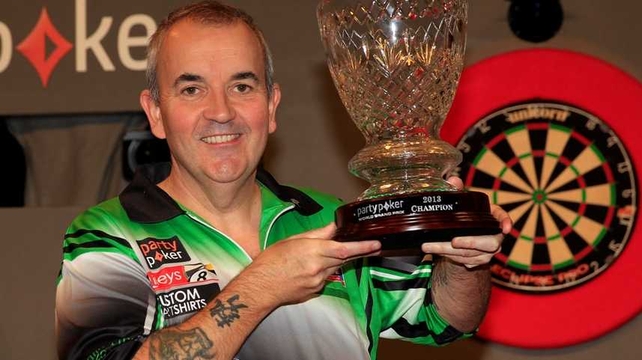 Phil Taylor with his trophy at Citywest