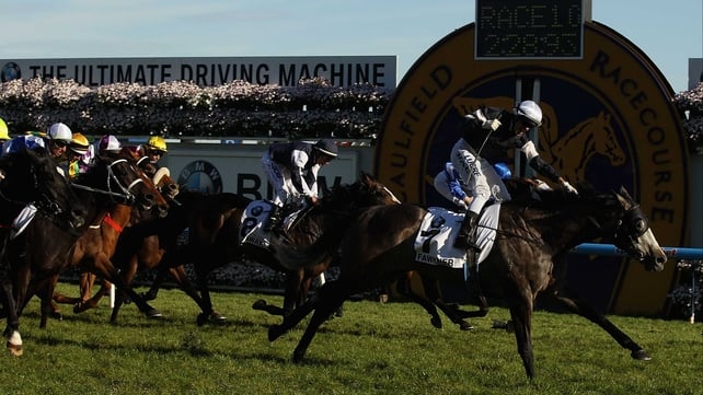 The blinkered Fawkner (10-1) landed the world's richest mile-and-a-half handicap under Nicholas Hall