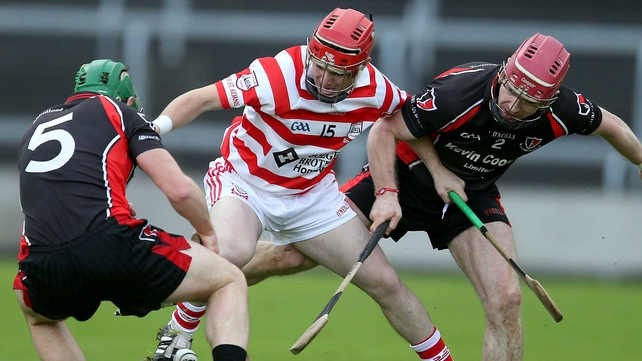 Oulart-The Ballagh's Laurence Pendergast and Paul Roche with Christopher O'Connor of Ferns St Aidan's