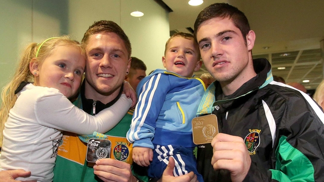 Jason Quigley with his sister Holli aged five and Joe Ward with his son Joe aged two