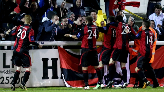 Longford celebrate scoring the equalising goal
