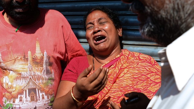 Relatives of those killed in a bus accident react after receiving news from police Relatives of those killed in a bus accident react after receiving news from police