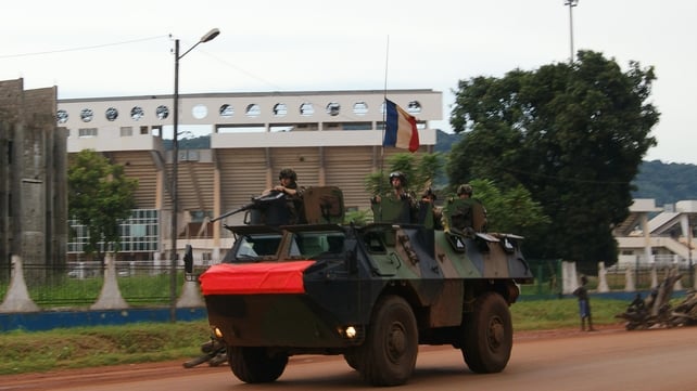 French soldiers patrol aboard a military vehicle on a street in Bangui French soldiers patrol aboard a military vehicle on a street in Bangui