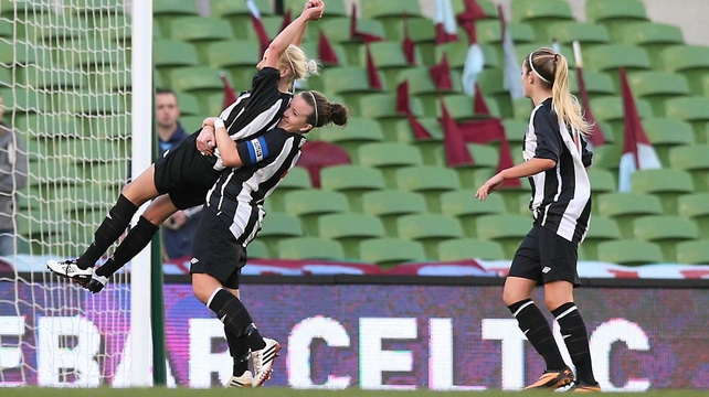 Caroline Thorpe of Raheny celebrates scoring from the penalty spot
