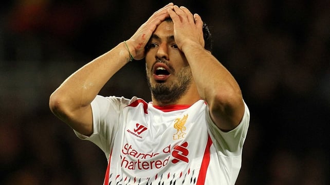Liverpool's Luis Suarez rues a missed chance against the Gunners