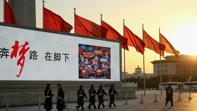 Paramilitary policemen patrol outside the Great Hall of the People where the Communist Party's 205-member Central Committee gathered for its third annual plenum Paramilitary policemen patrol outside the Great Hall of the People where the Communist Party's 205-member Central Committee gathered for its third annual plenum