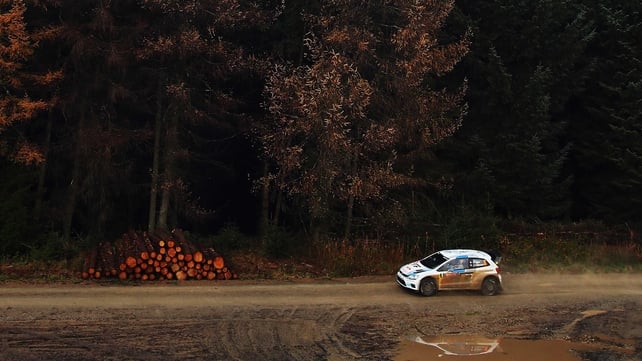 Sebastien Ogier guides his Volkswagen Polo R WRC car through the forests of Llandegla