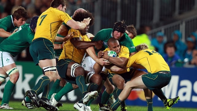 Stephen Ferris carries Will Genia towards his own line after a dominant Irish scrum during the RWC 2011 clash