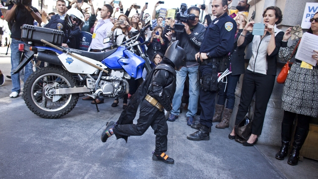 Miles, dressed as Batkid fought crime with his hero, Batman Miles, dressed as Batkid fought crime with his hero, Batman