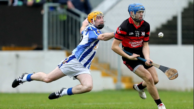 Eoin Doyle of Mount Leinster Rangers gets away from Stephen O'Connor