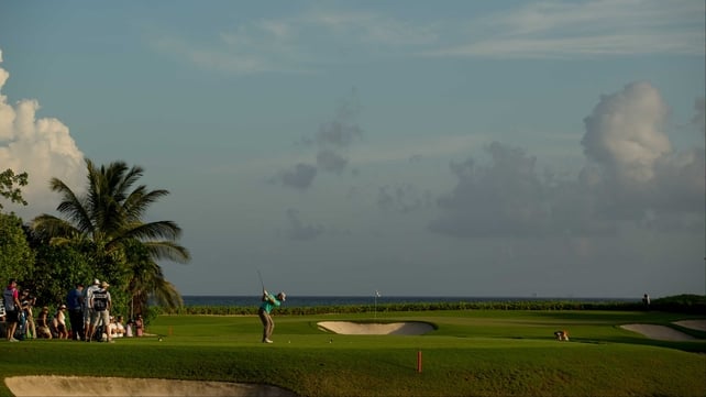 Harris English plays a tee shot at the fourth hole