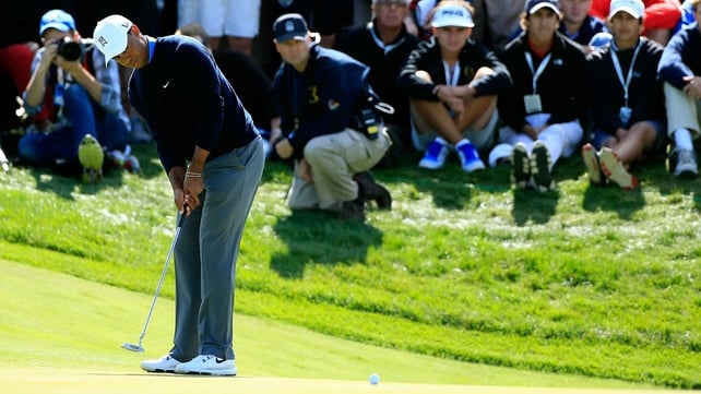 Tiger Woods suffered a two-stroke penalty at the BMW Championship after he tried to remove a twig from behind his ball