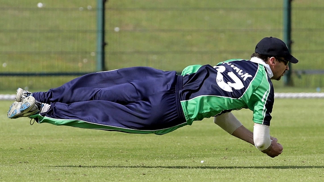 Alex Cusack takes a diving catch