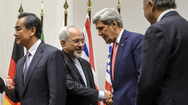 Iranian foreign minister Mohammad Javad Zarif shakes hands in Geneva with US Secretary of State John Kerry after the agreement Iranian foreign minister Mohammad Javad Zarif shakes hands in Geneva with US Secretary of State John Kerry after the agreement