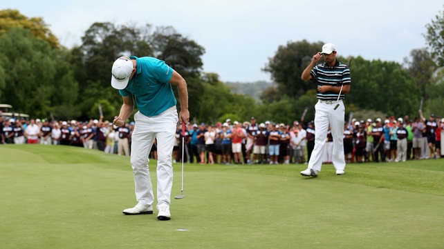 Morten Orum Madsen celebrates as he finishes on the 18th in Ekurhuleni