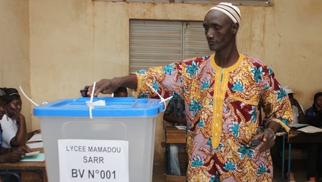 A man casts his vote at a polling station in Bamako, Mali A man casts his vote at a polling station in Bamako, Mali