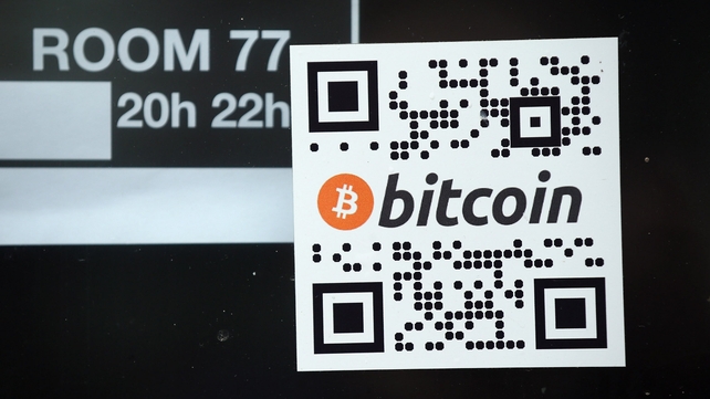 A sticker on the window of a local pub indicates the acceptance of Bitcoins for payment A sticker on the window of a local pub indicates the acceptance of Bitcoins for payment