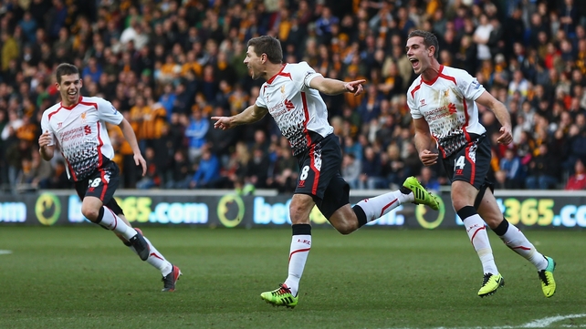 Steven Gerrard celebrates scoring his free kick