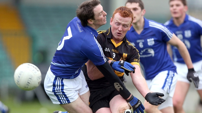 Crokes' Johnny Buckley (r) collides with Barry Duggan of Cratloe