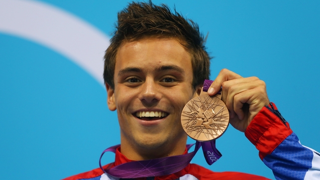 Diving star Tom Daley has revealed he is dating a man Diving star Tom Daley has revealed he is dating a man
