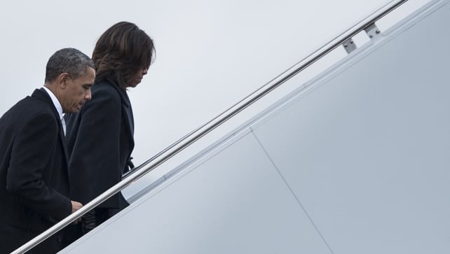 US President Barack Obama and First Lady Michelle Obama board Air Force One to fly to South Africa US President Barack Obama and First Lady Michelle Obama board Air Force One to fly to South Africa