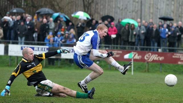 Ballinderry's Collie Devlin scores past Kingdom Kerry Gaels 'keeper Shaun Howard