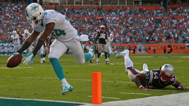 Marcus Thigpen's touchdown secured victory for the Miami Dolphins against the New England Patriots