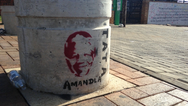 A Soweto street bollard with a Mandela tribute, a common sight now in South Africa A Soweto street bollard with a Mandela tribute, a common sight now in South Africa