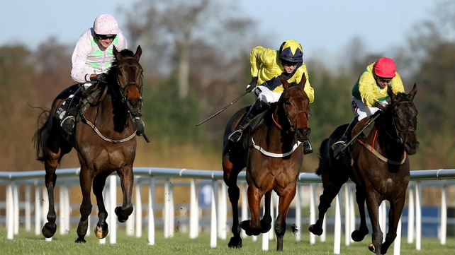Clondaw Court (left) was steered to victory by Ruby Walsh