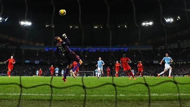 Simon Mignolet fails to deal with Alvaro Negredo's winner for City