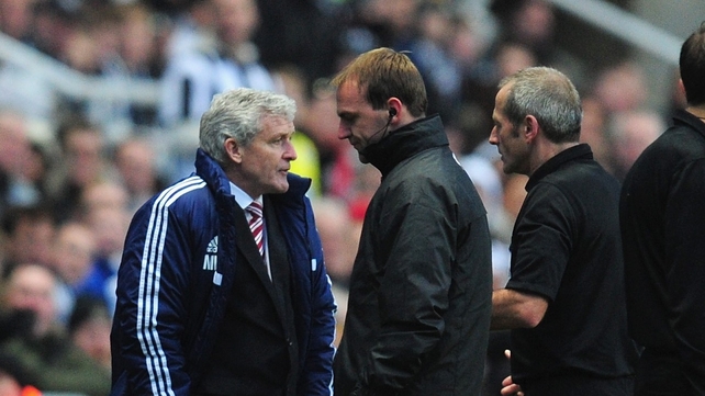 Mark Hughes being sent to the stands by referee Martin Atkinson