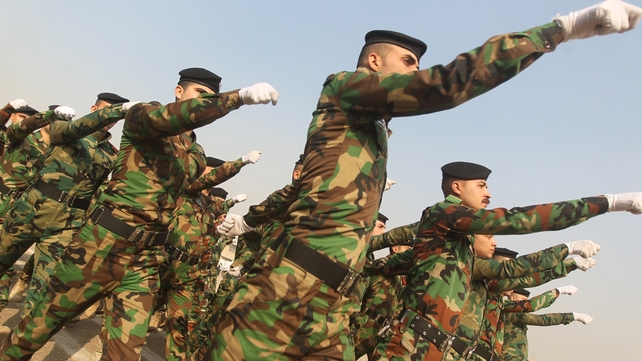 Iraqi soldiers parade during a ceremony marking police forces 92nd anniversary in the capital Baghdad Iraqi soldiers parade during a ceremony marking police forces 92nd anniversary in the capital Baghdad