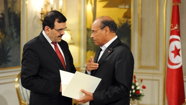 Ali Larayedh (left) submits his resignation to Tunisian President Moncef Marzouk Ali Larayedh (left) submits his resignation to Tunisian President Moncef Marzouk