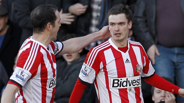 John O'Shea and Adam Johnston celebrate the striker's opener