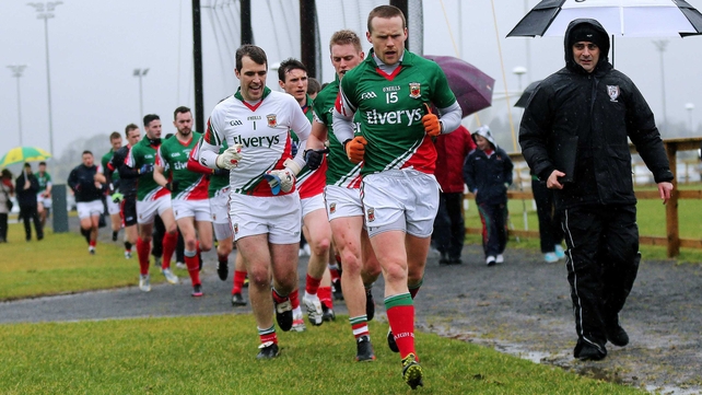 Mayo captain Andy Moran leads his team out to start the game